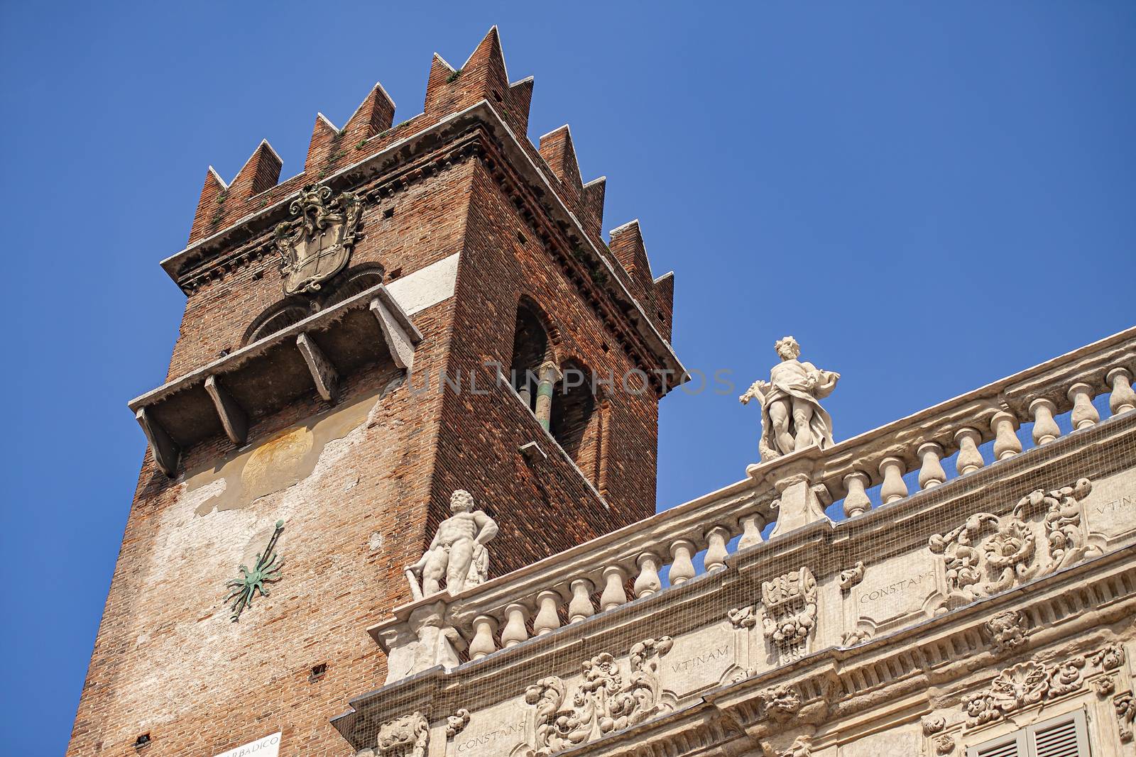 Verona castle tower detail in Piazza delle Erbe, Erbe sqaure in english