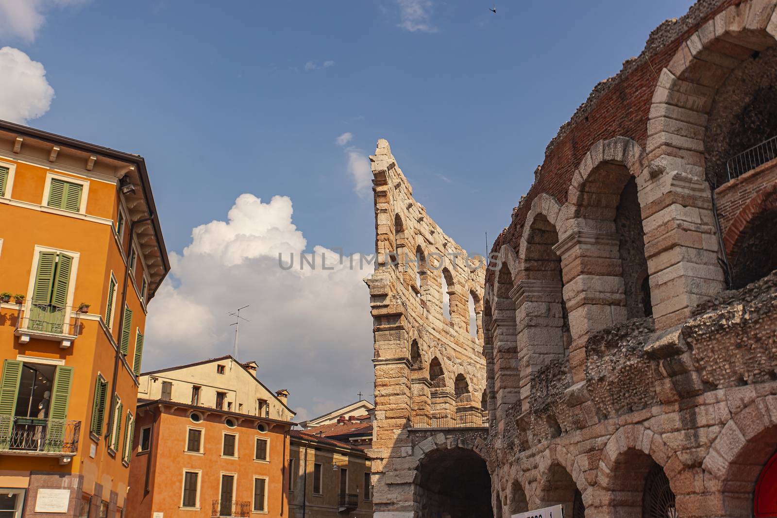 Arena di Verona Detail under a blue sky by pippocarlot