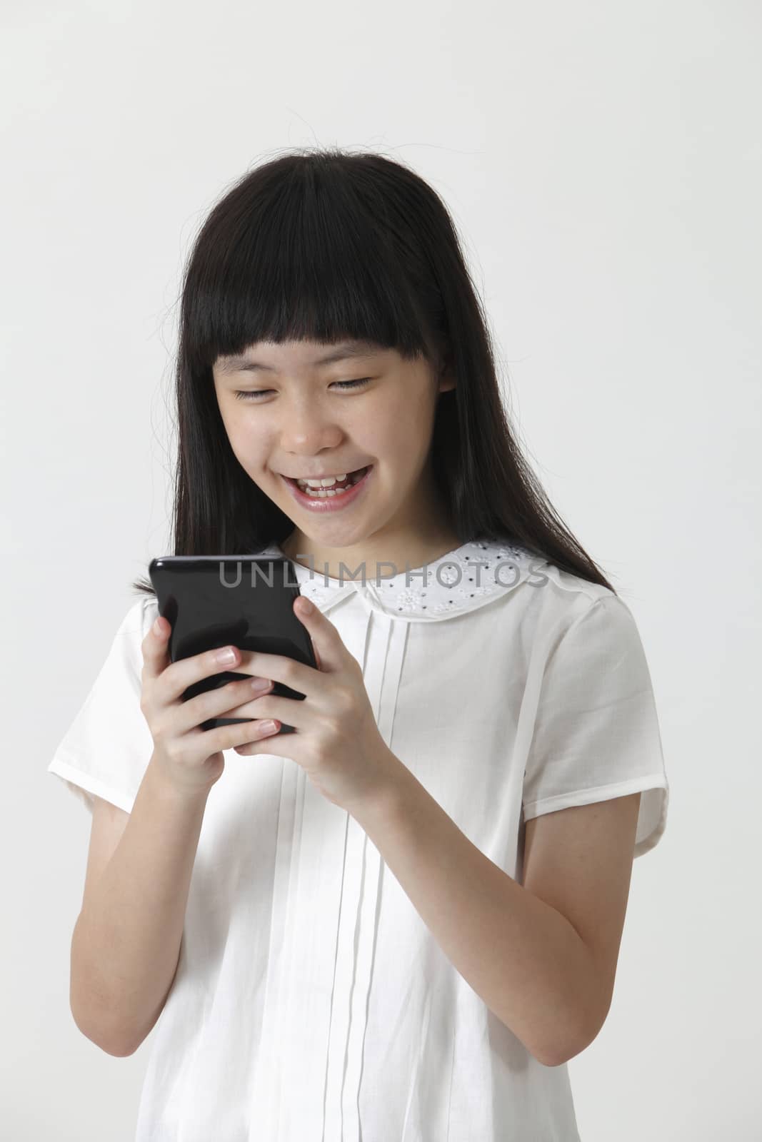 chinese girl happy reading sms