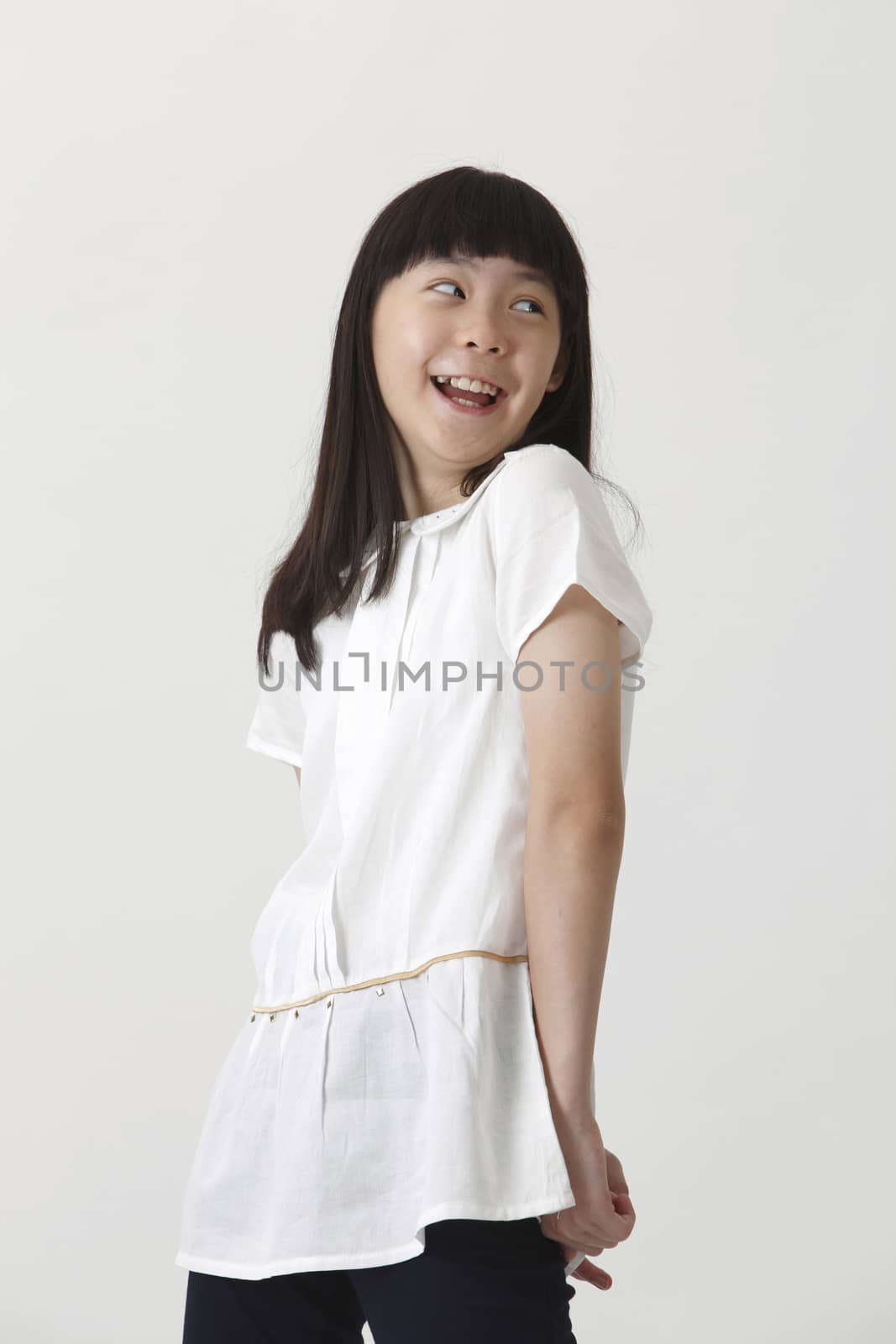 chinese girl with surprise expression and looking away