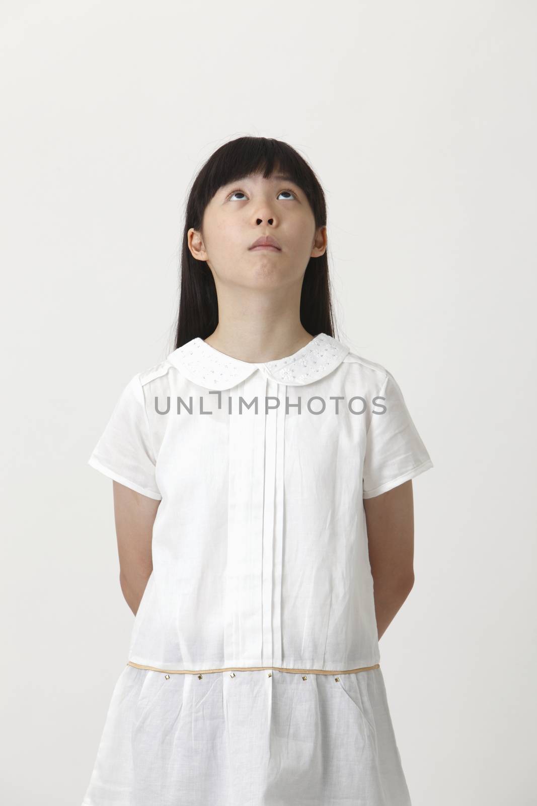 chinese girl with the doubtful expression