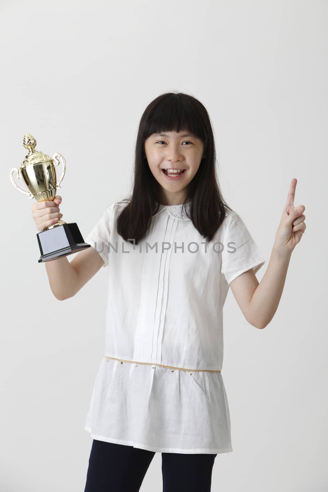 chinese girl holding trophy and with gesture 1