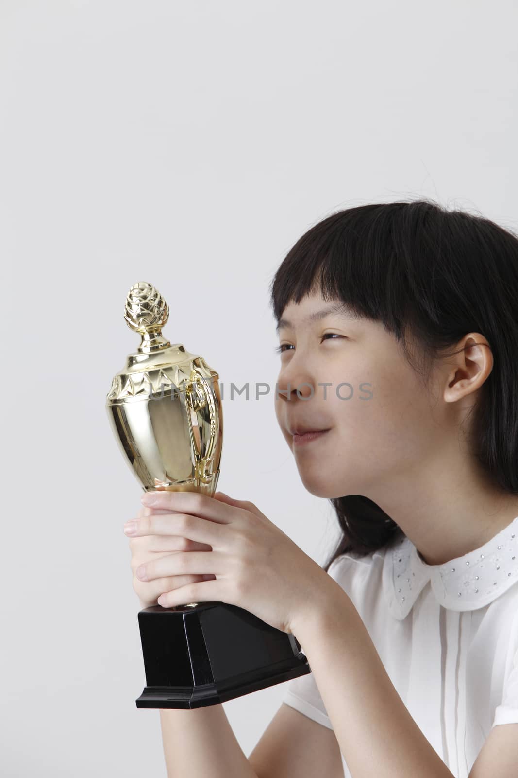 chinese girl happy to own a trophy