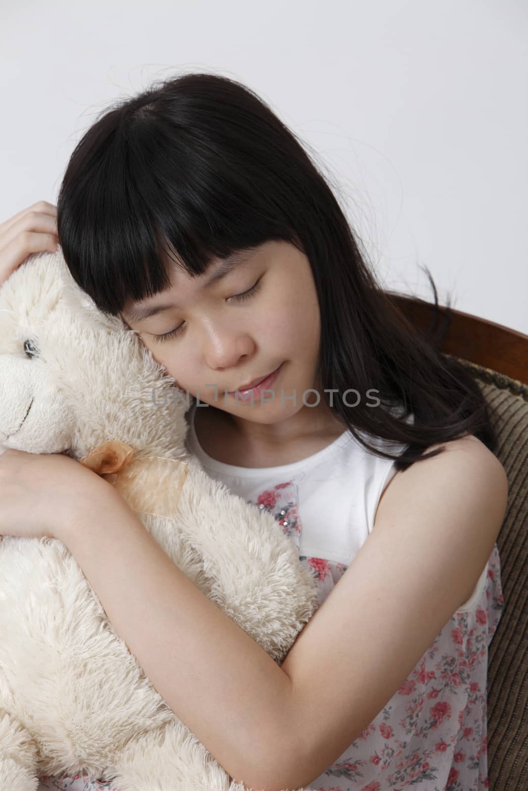 chinese girl sleeping with teddy bear