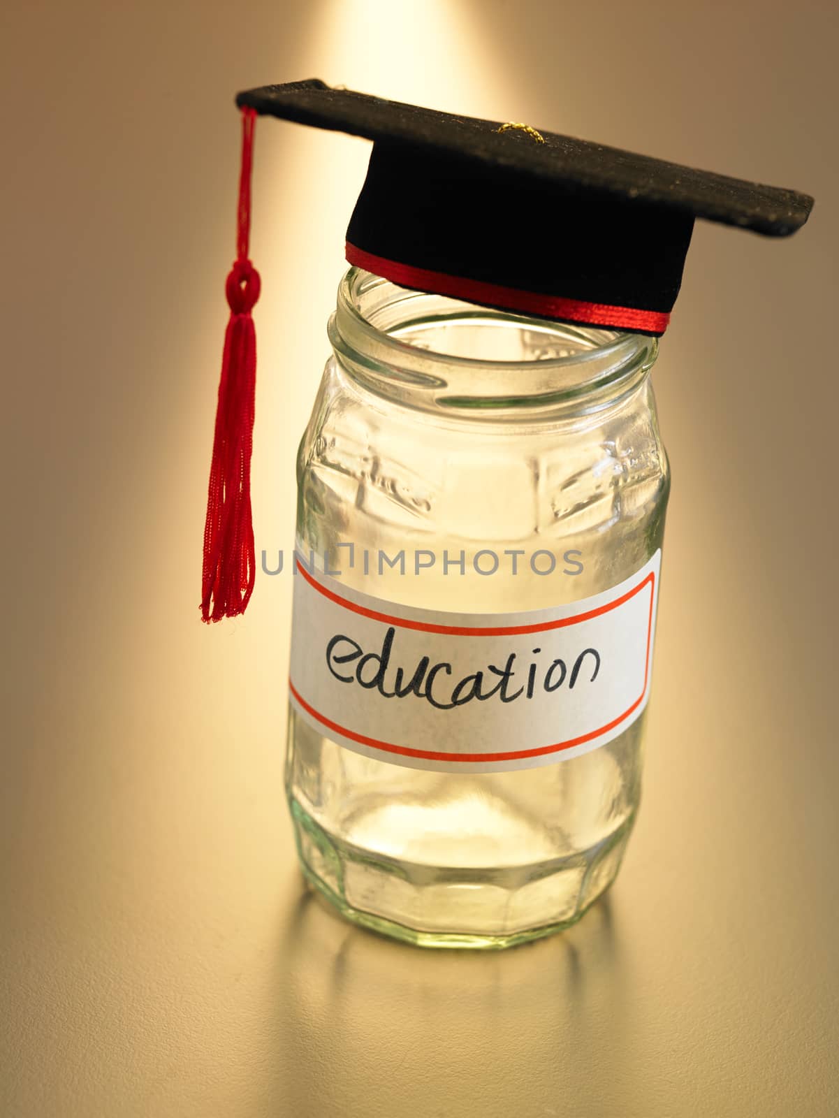 mortar board on the saving jar