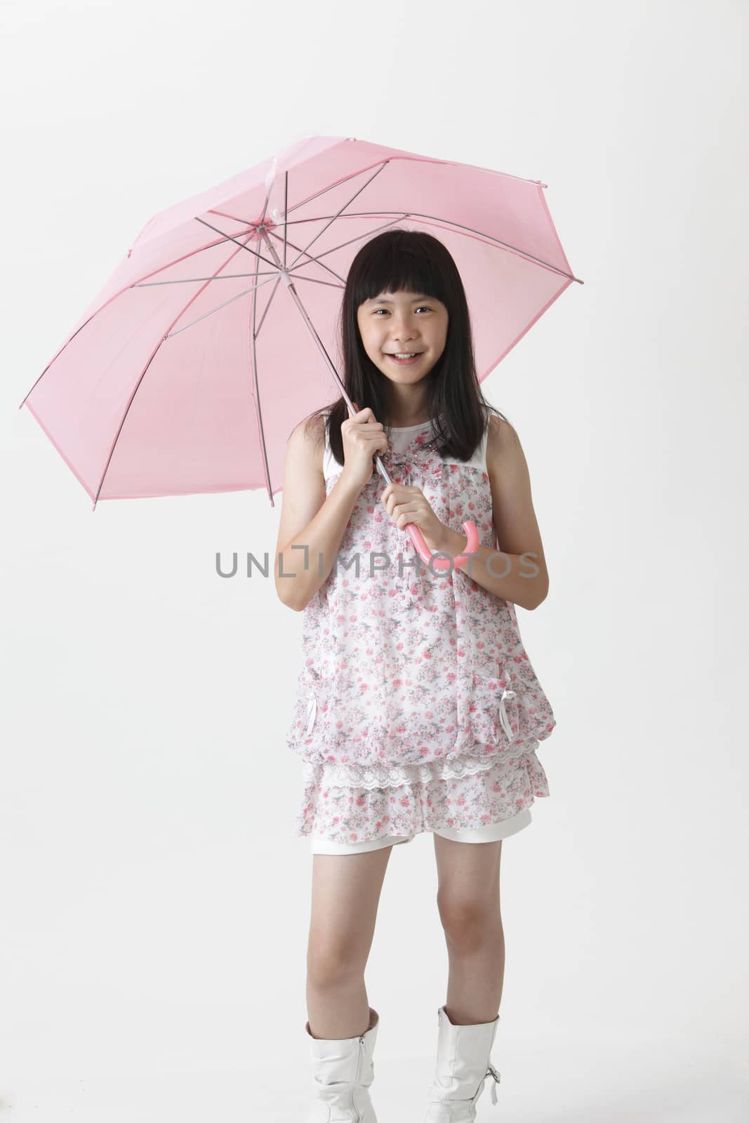 girl holding umbrella by eskaylim