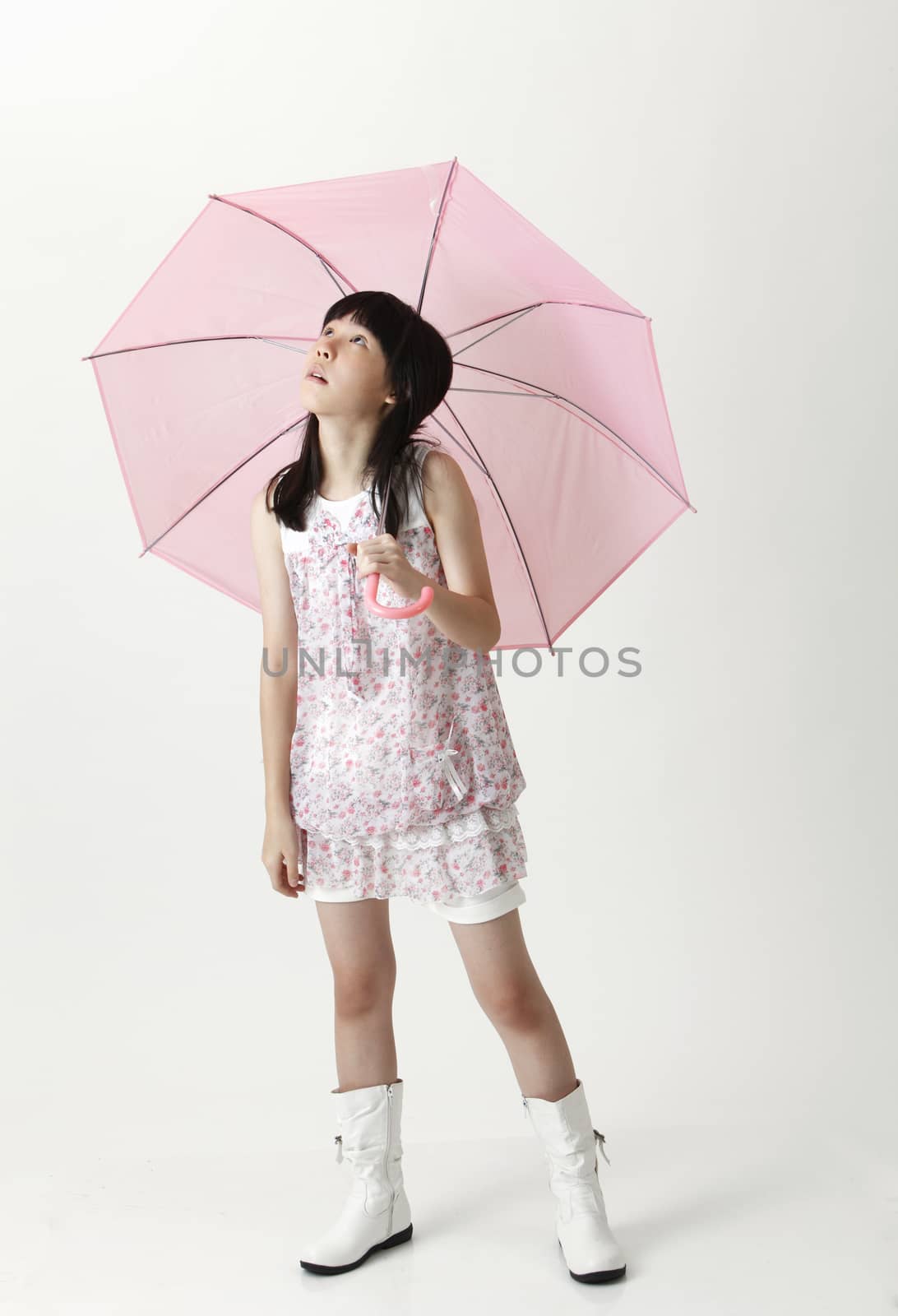 chinese girl holding a pink umbrella