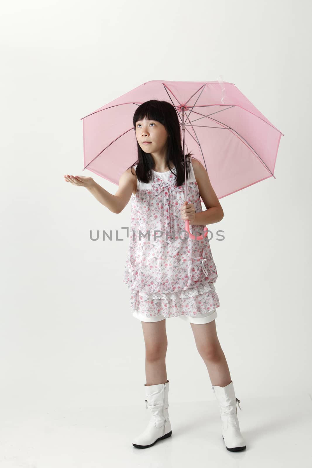 chinese girl holding a pink umbrella