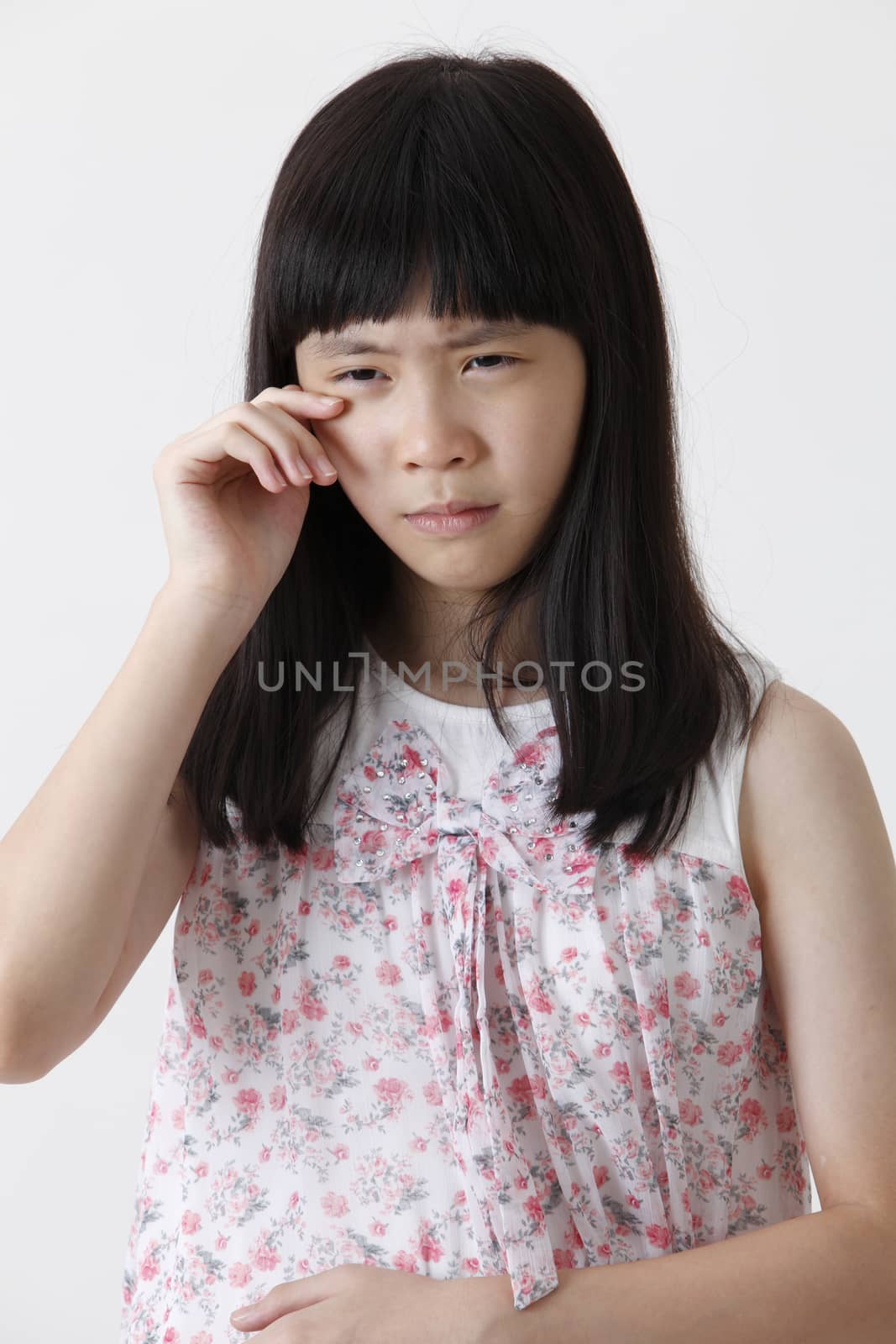 chinese girl with sad expression