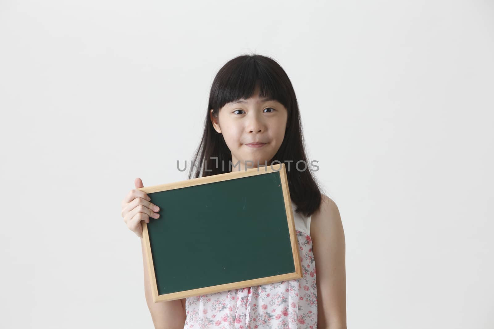 girl holding blackboard by eskaylim