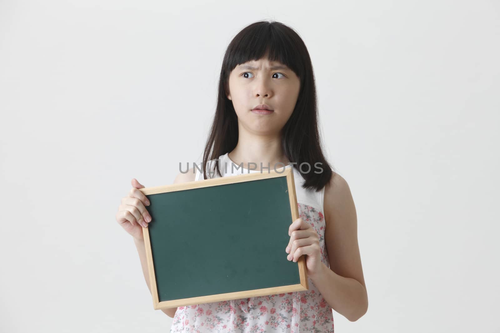 girl holding blackboard by eskaylim