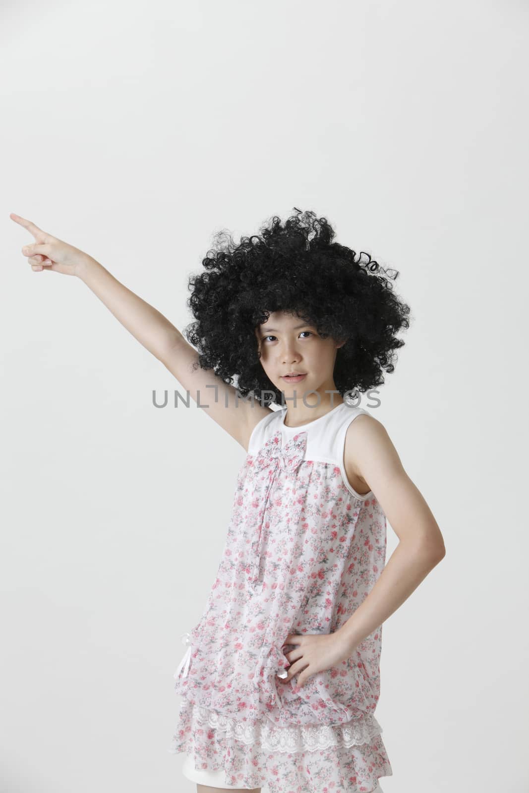 chinese girl wearing a big black wig dancing