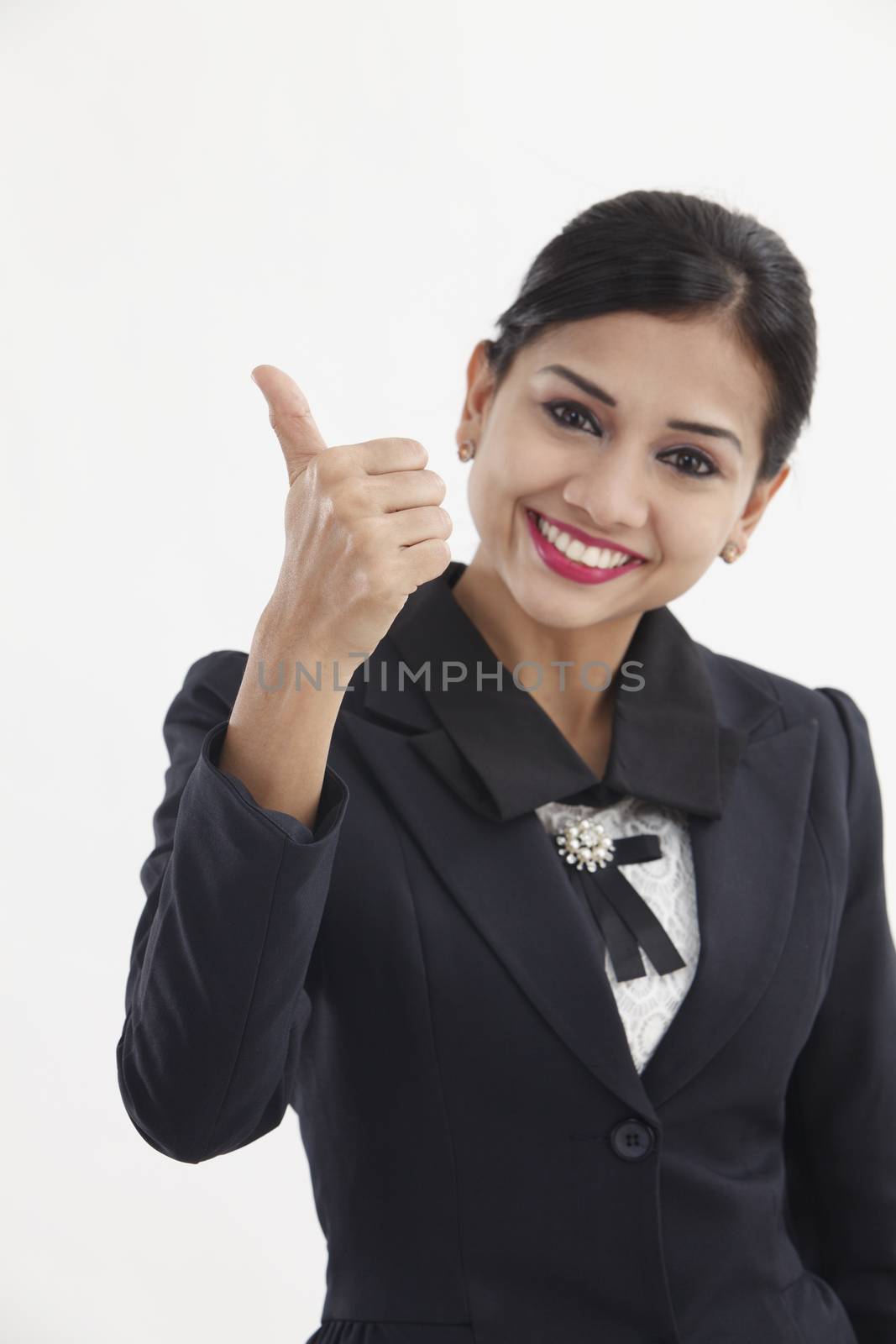  formal Asian Business woman with thumbs up