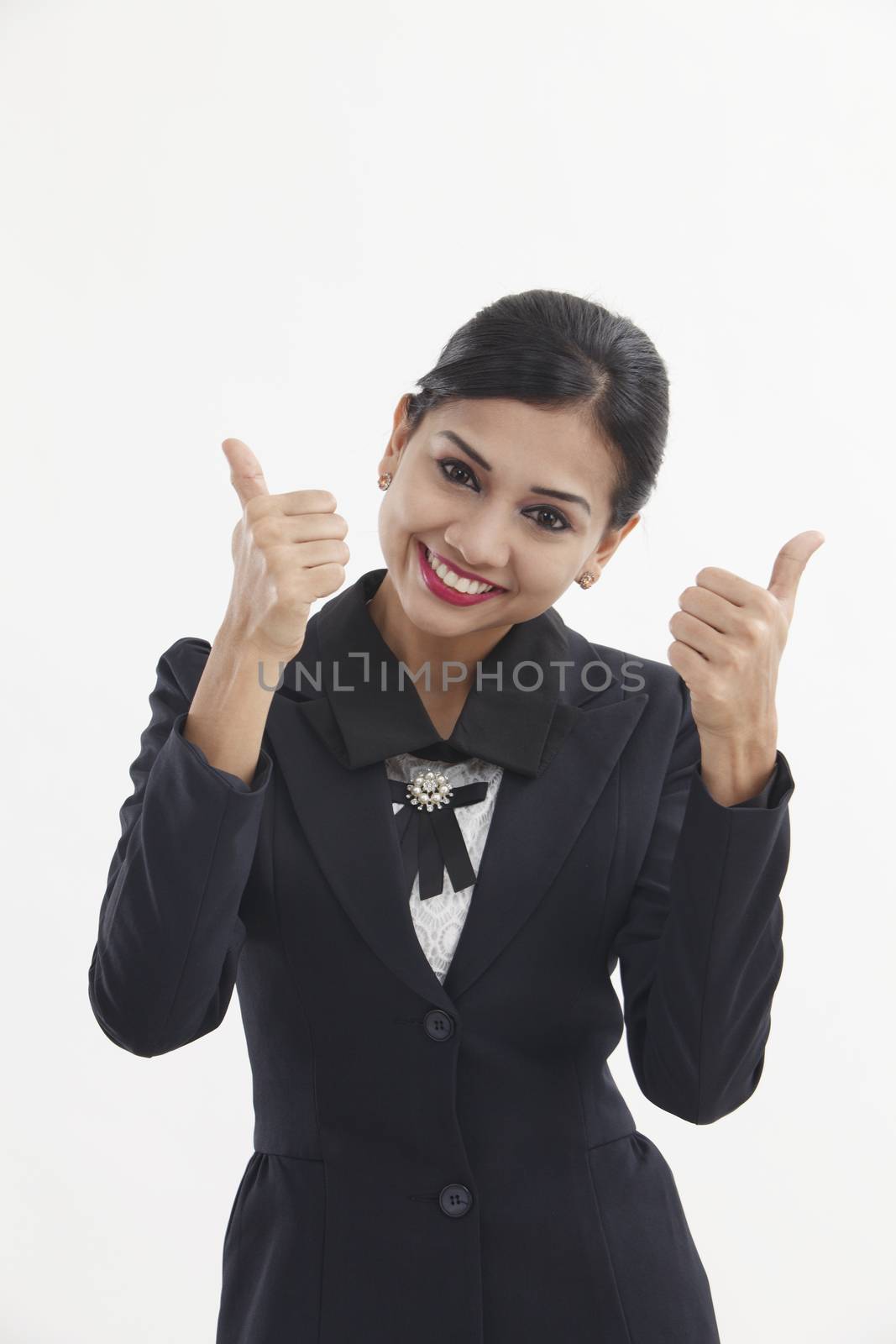  formal Asian Business woman with thumbs up