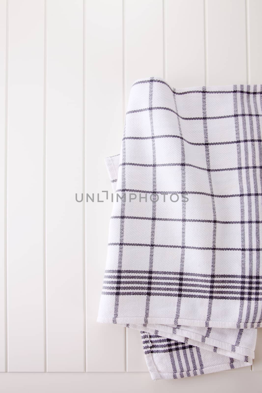 checkered napkin on wooden white  table