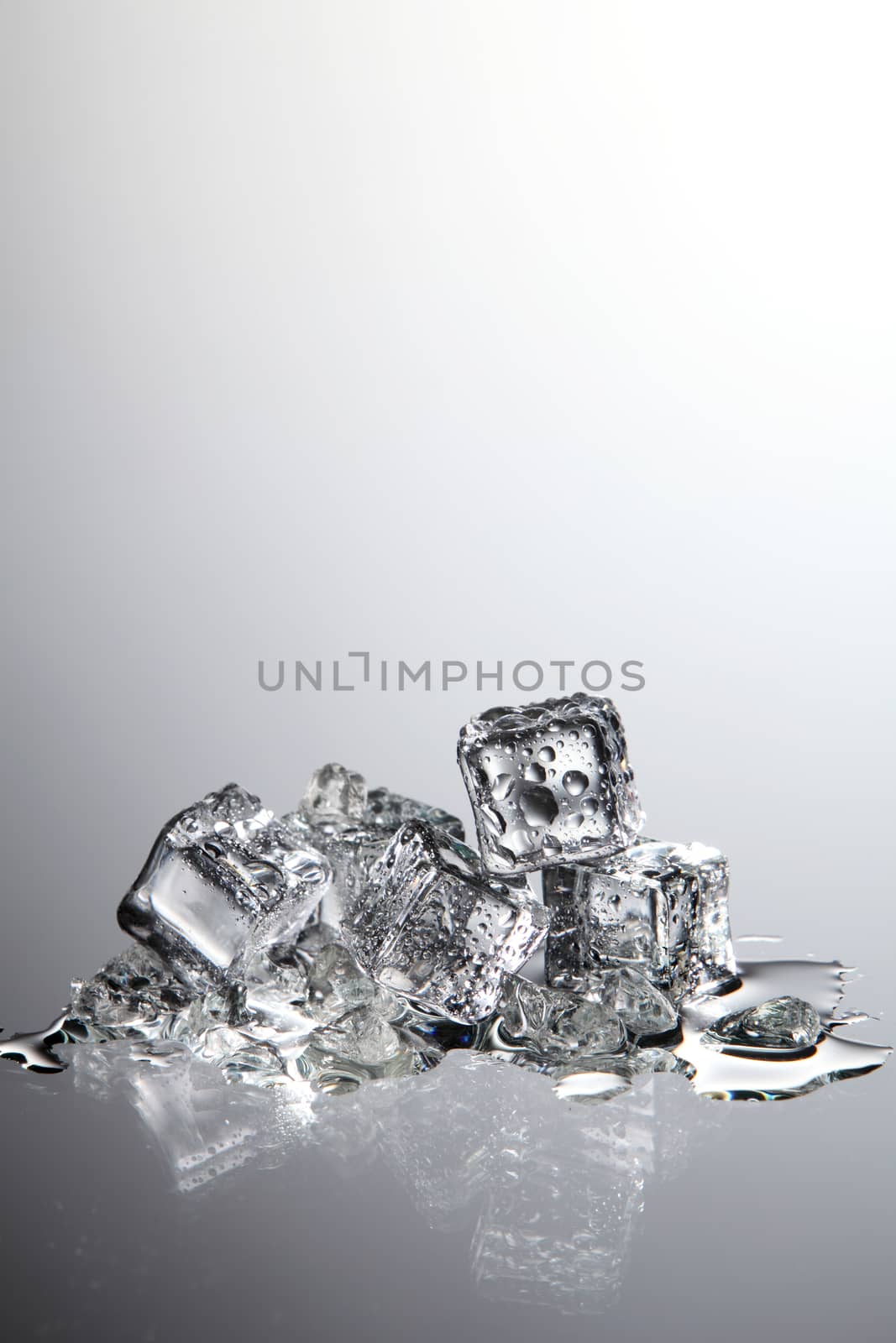 ice cube with water drop on the white background