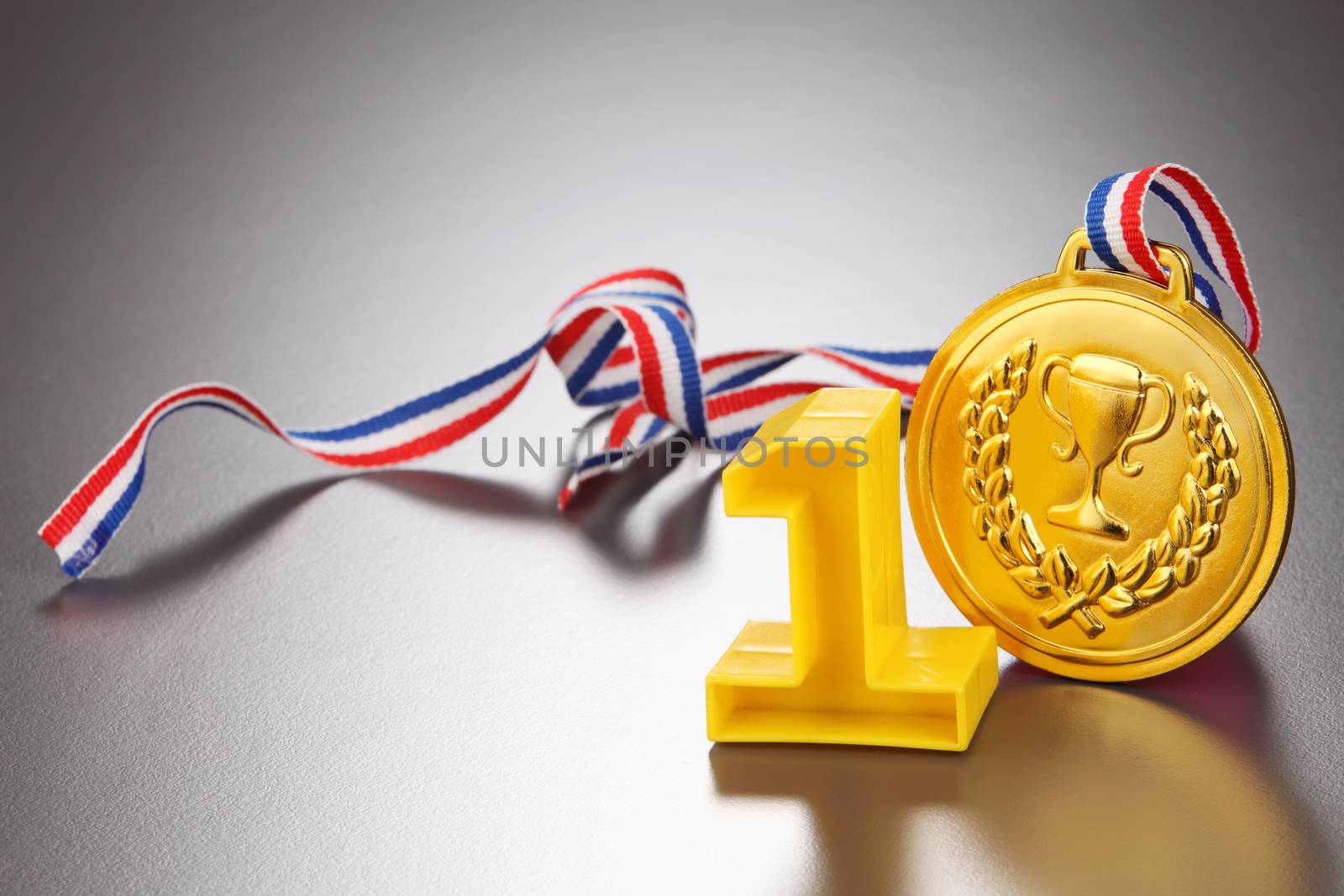 number one and golden medal