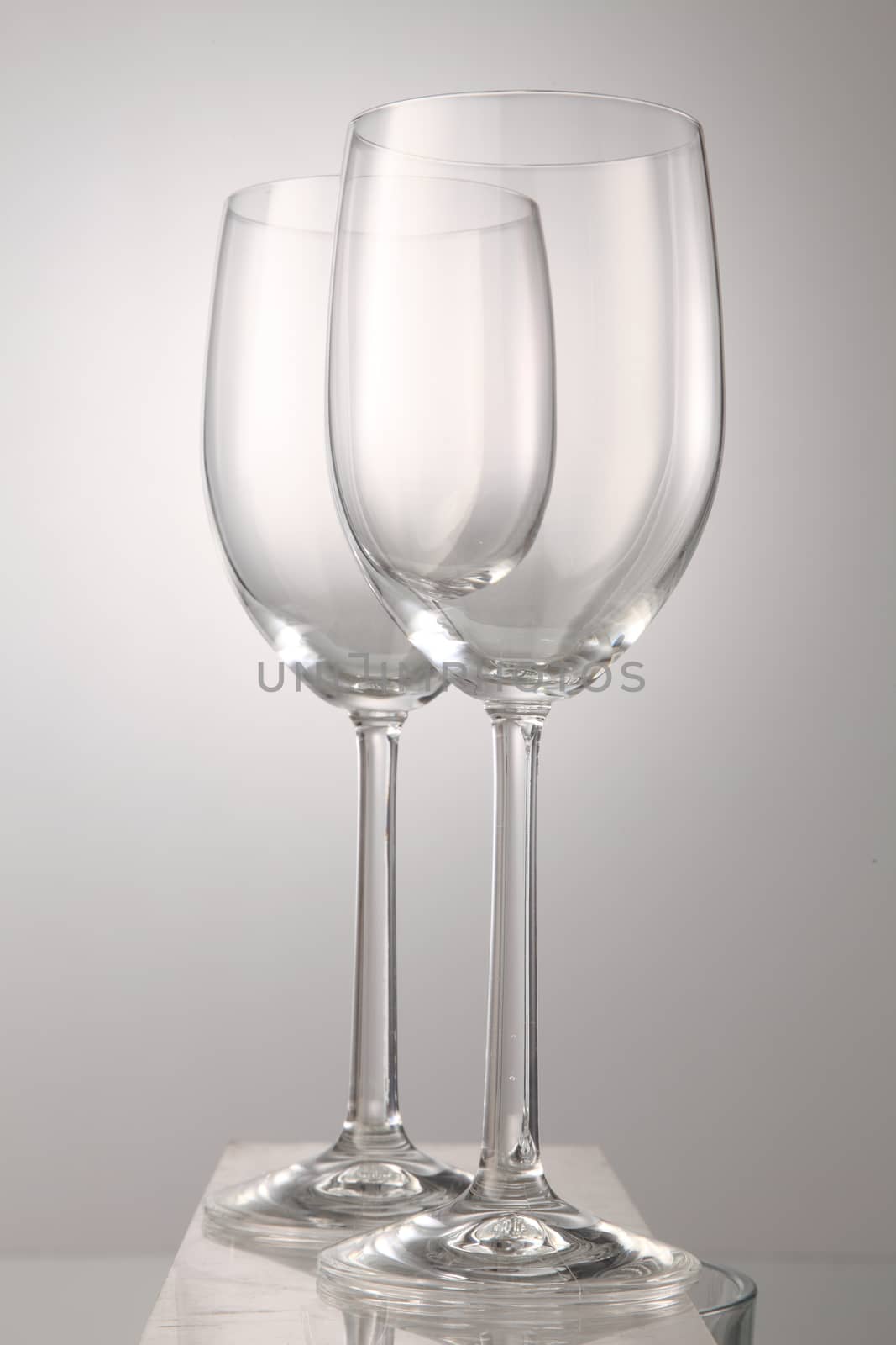 Two empty wine glass isolated on white