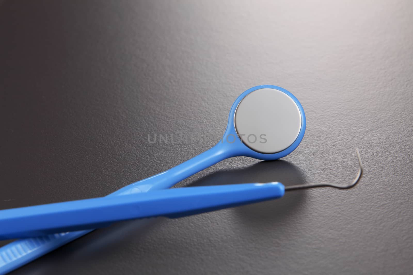 Basic dentist tools isolated on gray