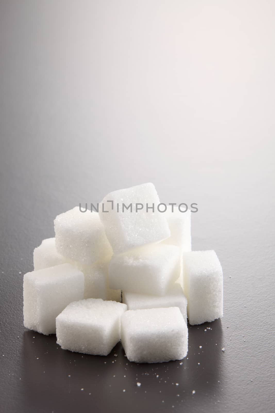 sugar cube on gray background