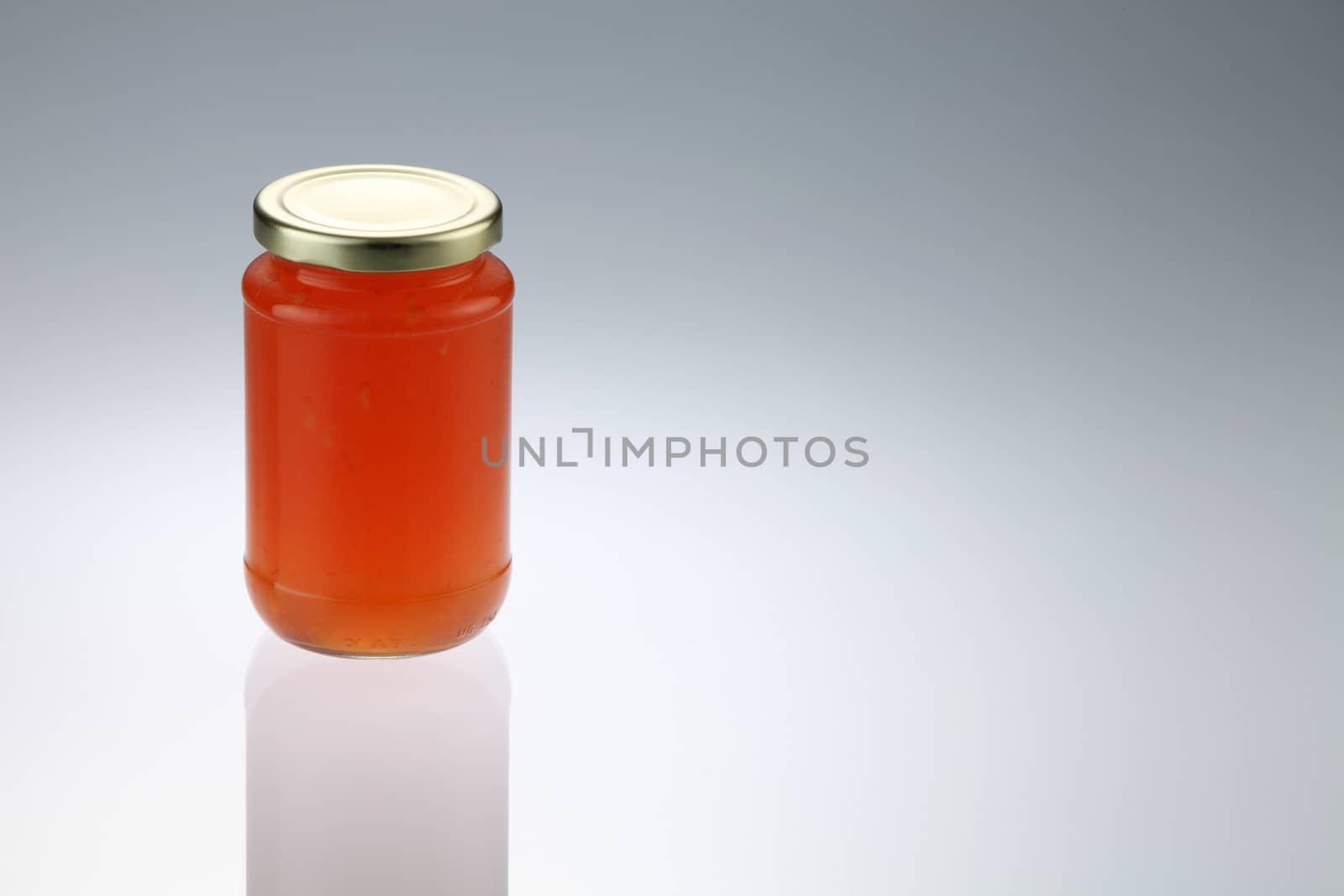 citrus jam jar isolated on white background