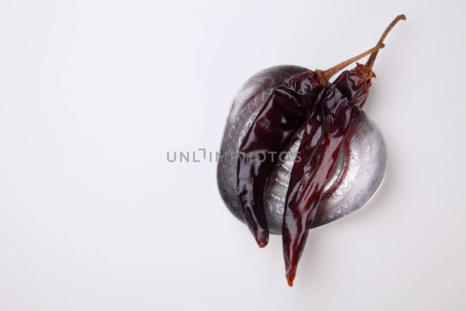 dried chili on the white background