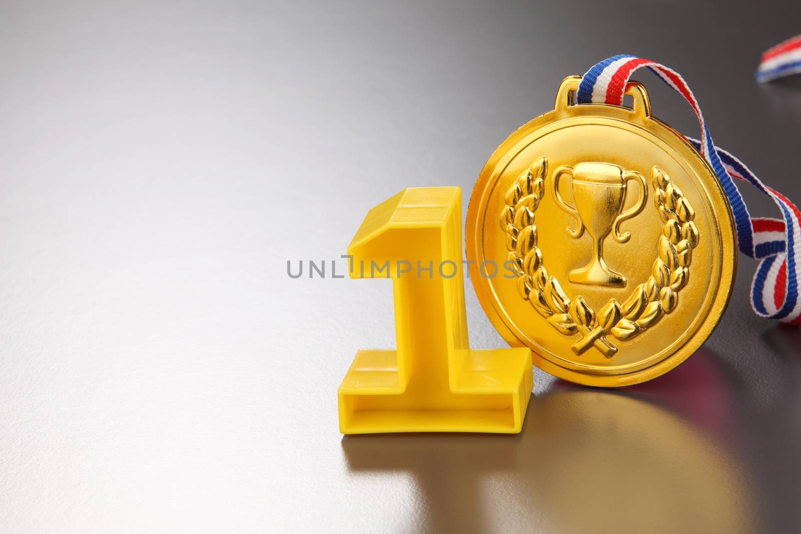 number one and golden medal