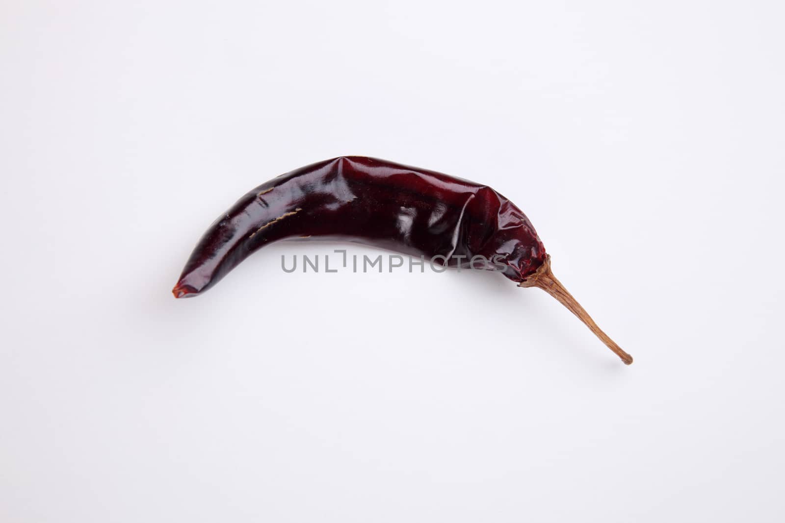 dried chili on the white background