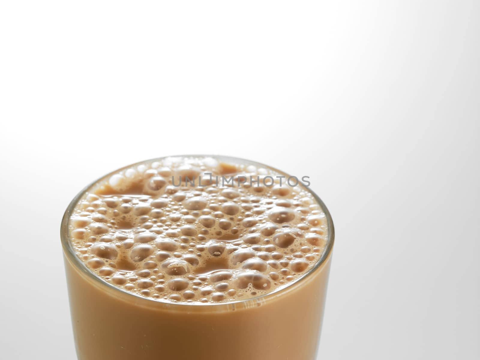 Big glass Tea with milk or Teh Tarik in Malaysia