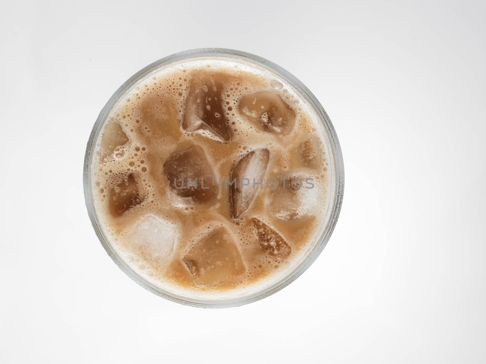 Top view milk tea with ice cube or teh tarik with ice