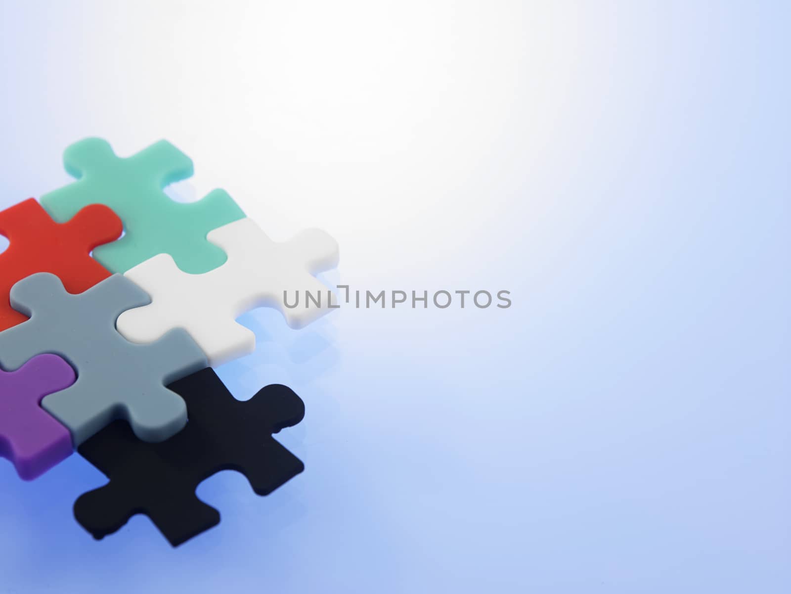 Business Teamwork Concept by Jigsaw Puzzle Pieces


