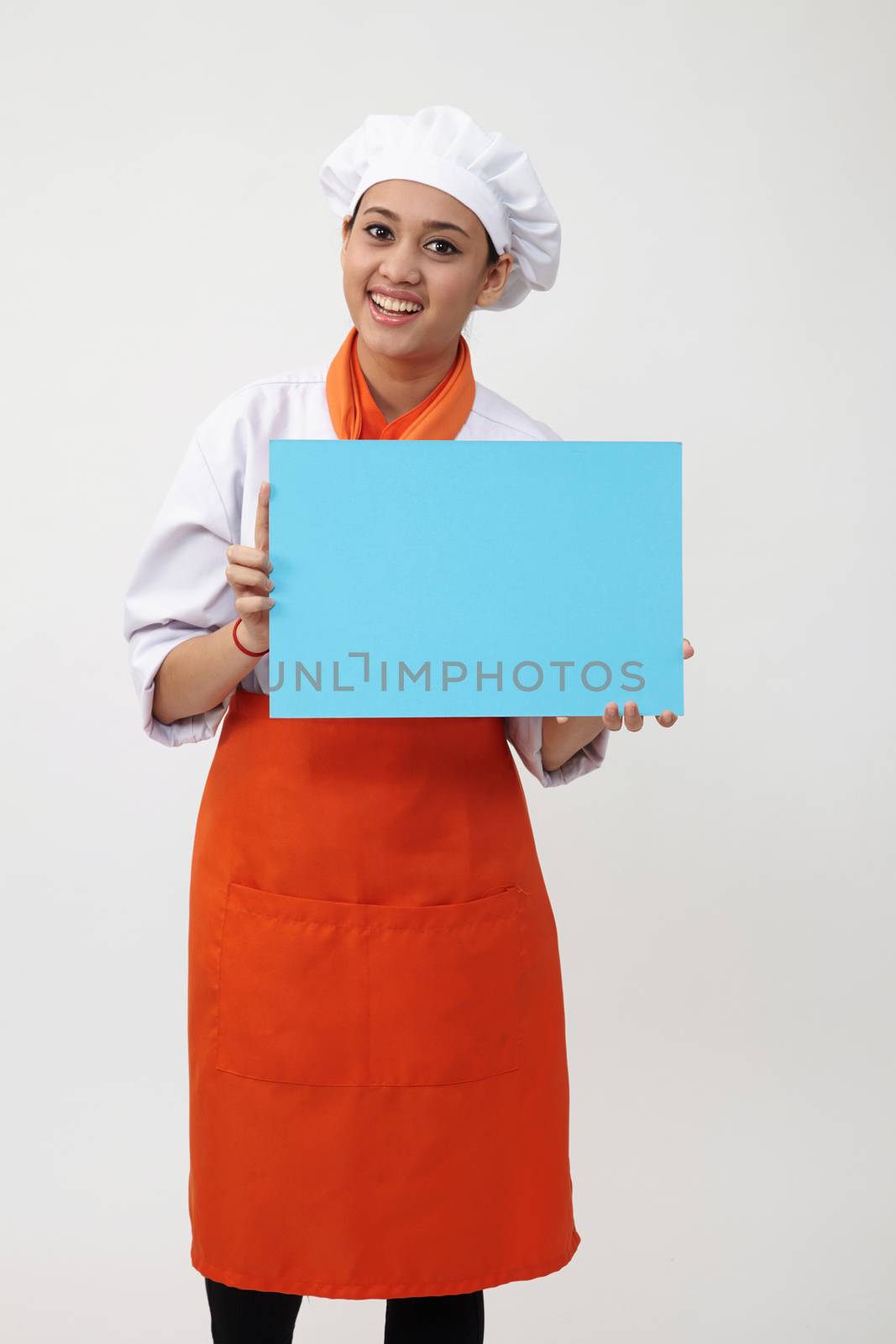  woman chef holding card by eskaylim
