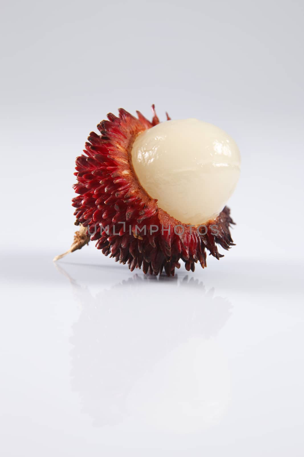 pulasan  thick skin or wild rambutan on the white background