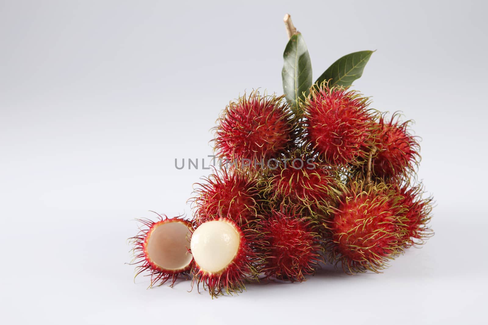 asian fruit rambutan on the plain background