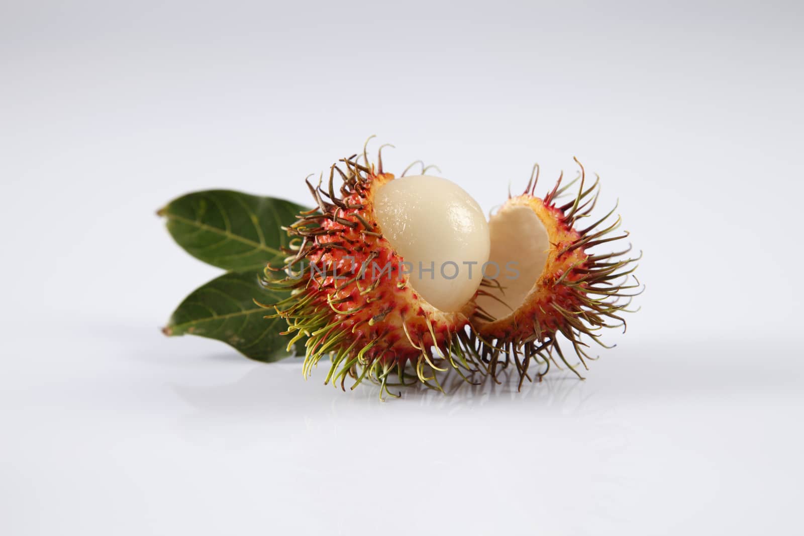 asian fruit rambutan on the plain background