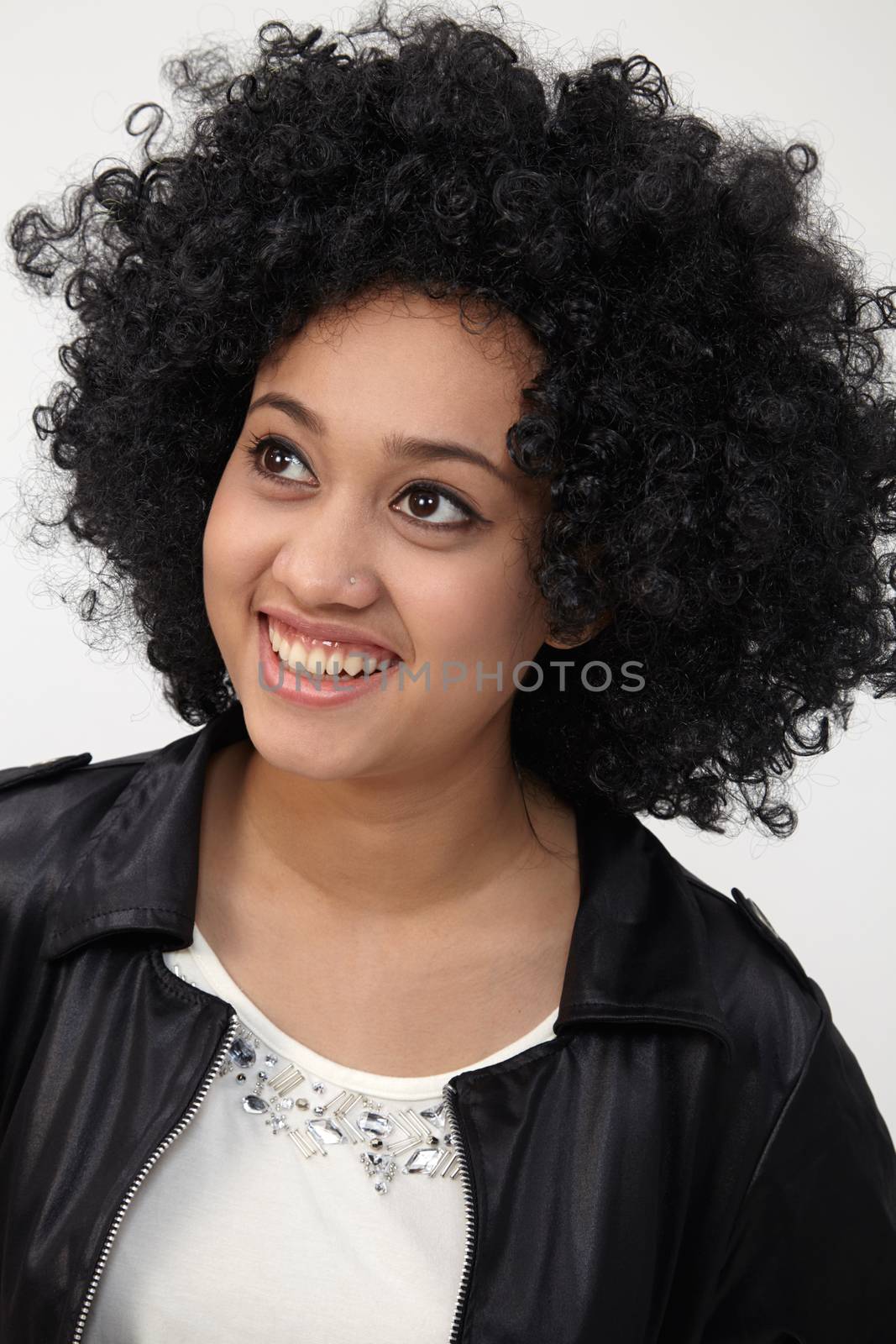 Happy girl with big afro hair