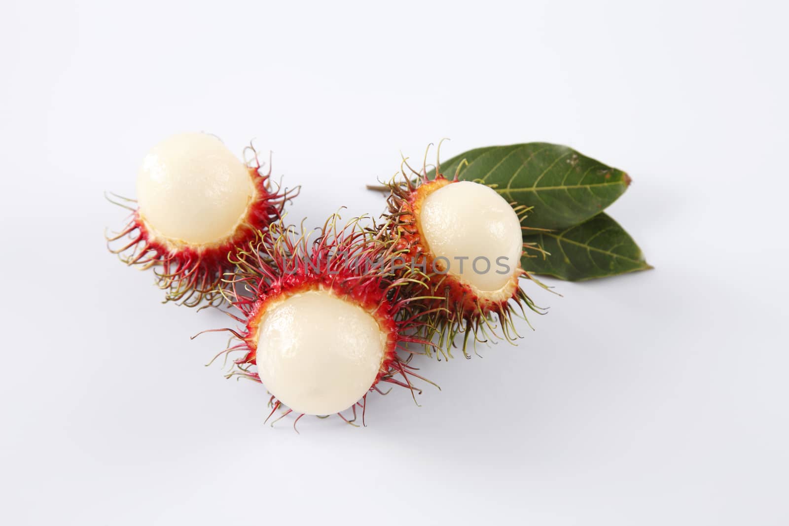 asian fruit rambutan on the plain background