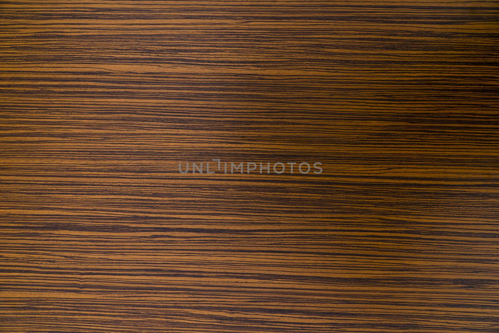 Zebrawood design of brown and black striped color on a laminated table top. by sonandonures