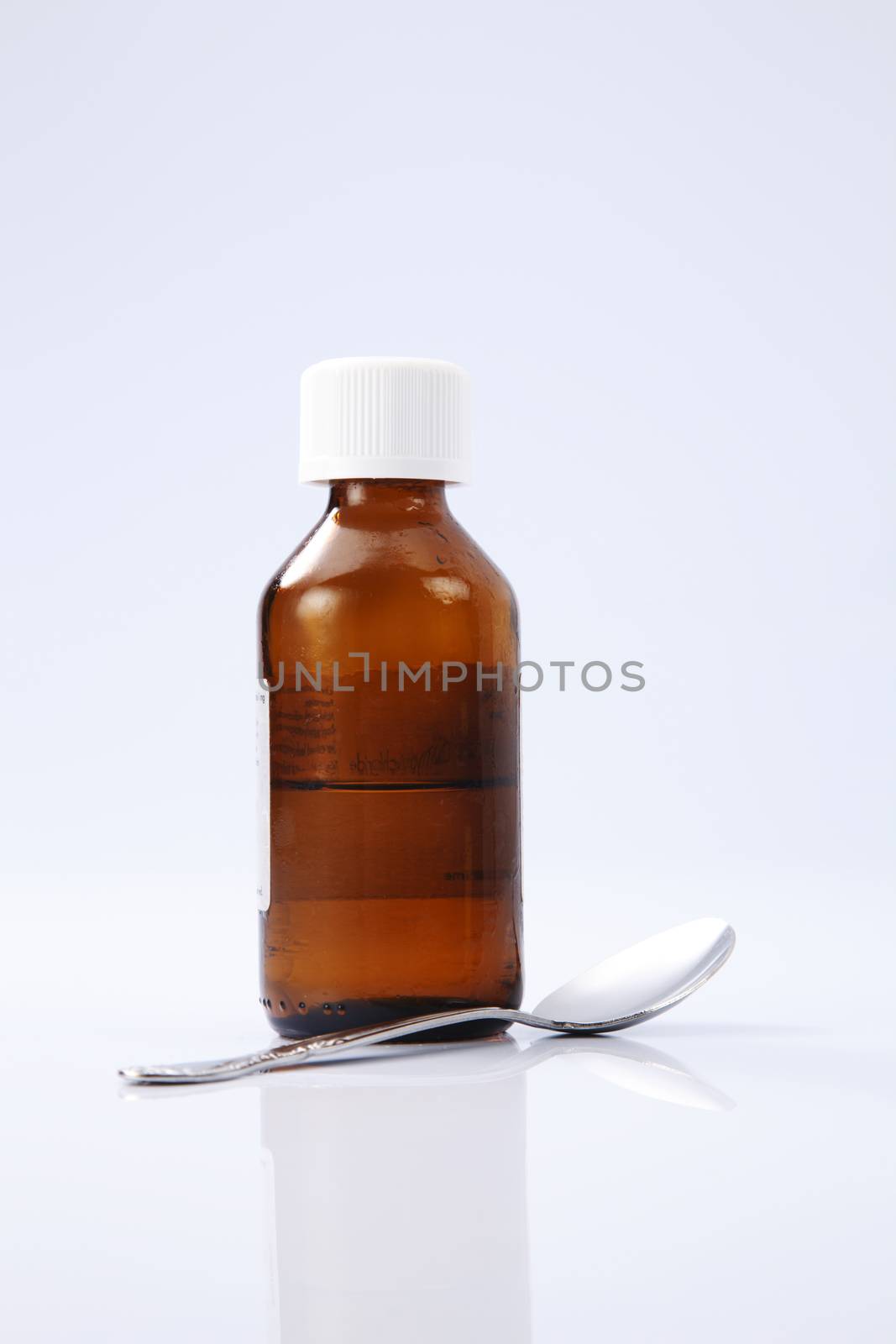 liquid medicine in the brown bottle