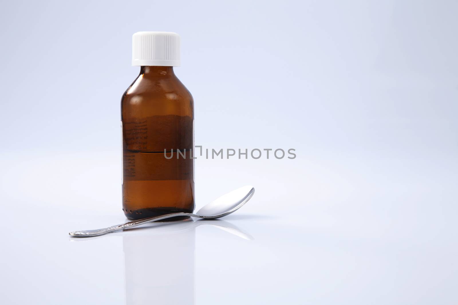 liquid medicine in the brown bottle