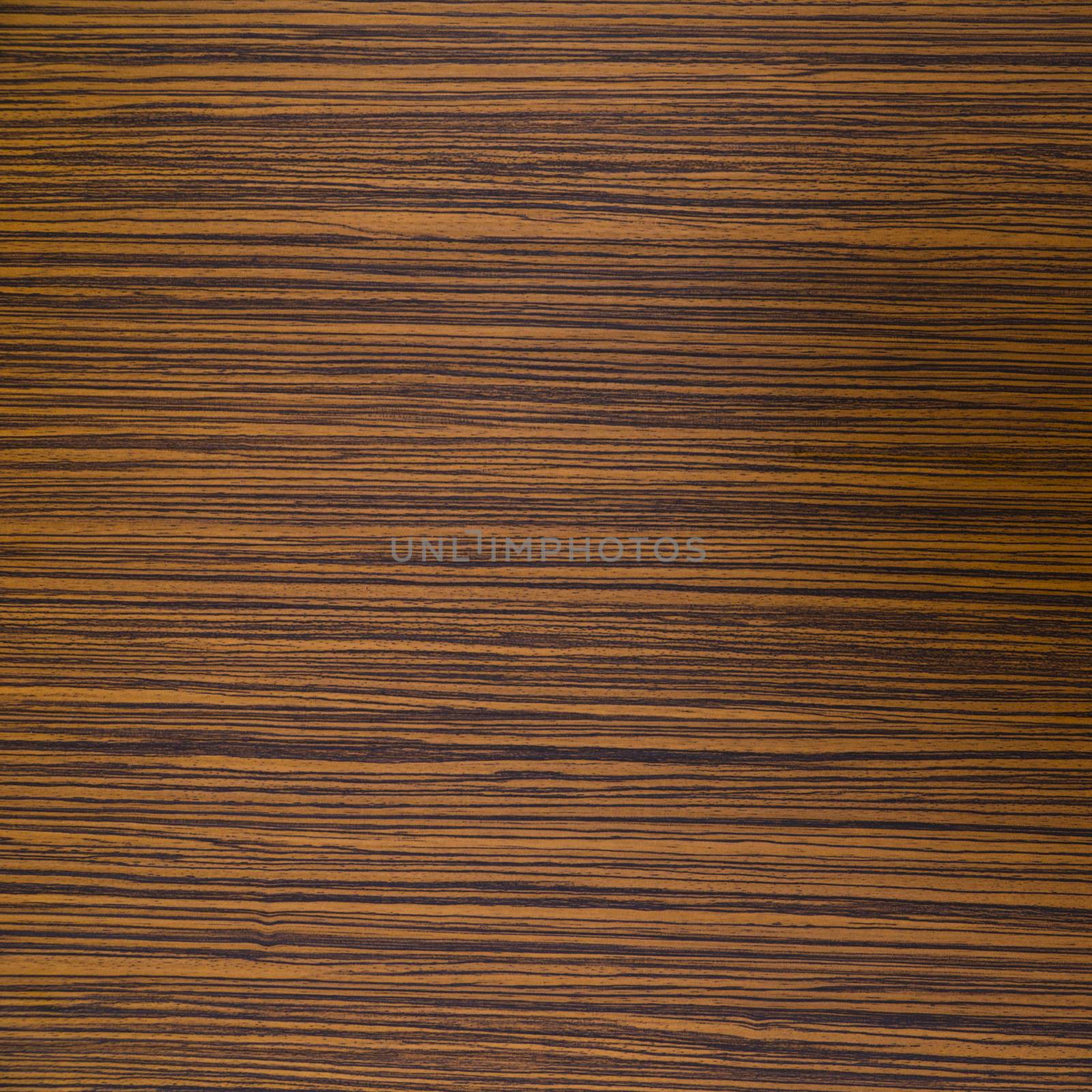 Zebrawood design of brown and black striped color on a laminated table top.