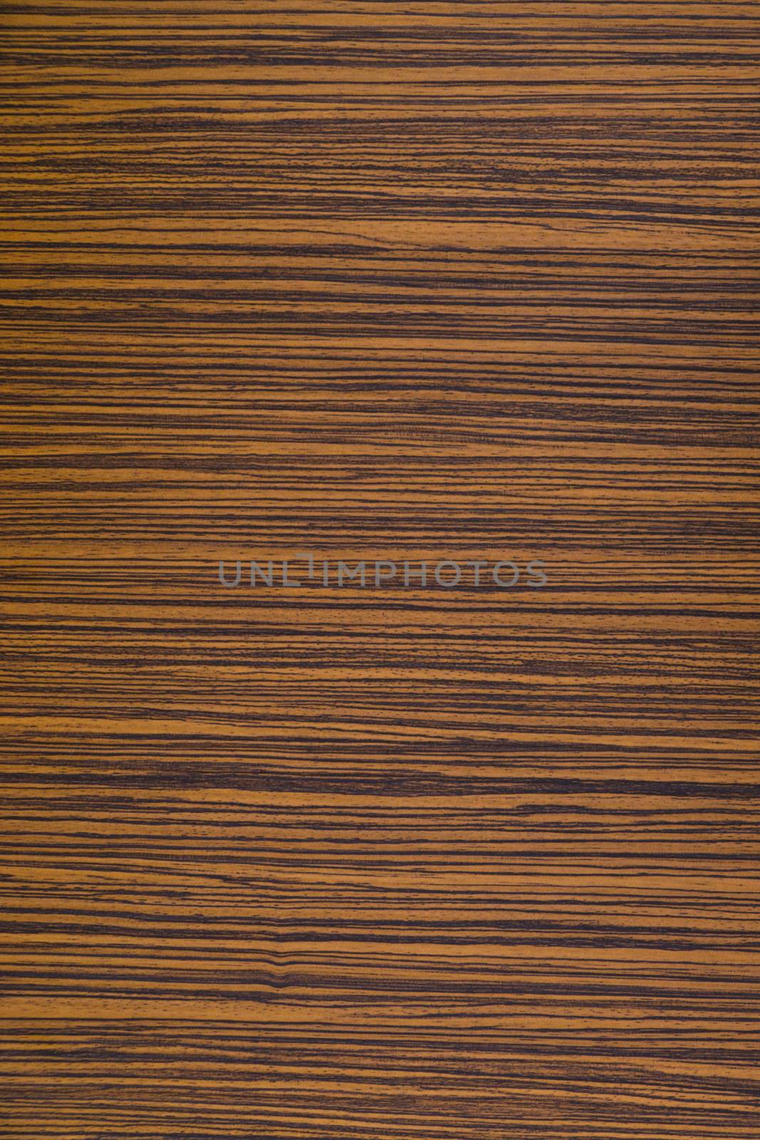 Zebrawood design of brown and black striped color on a laminated table top. by sonandonures