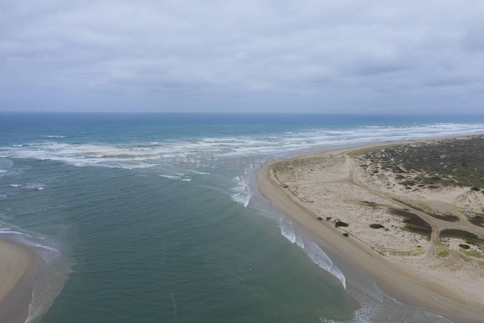 Aerial view of people fishing at the mouth of the Murray River in South Australia