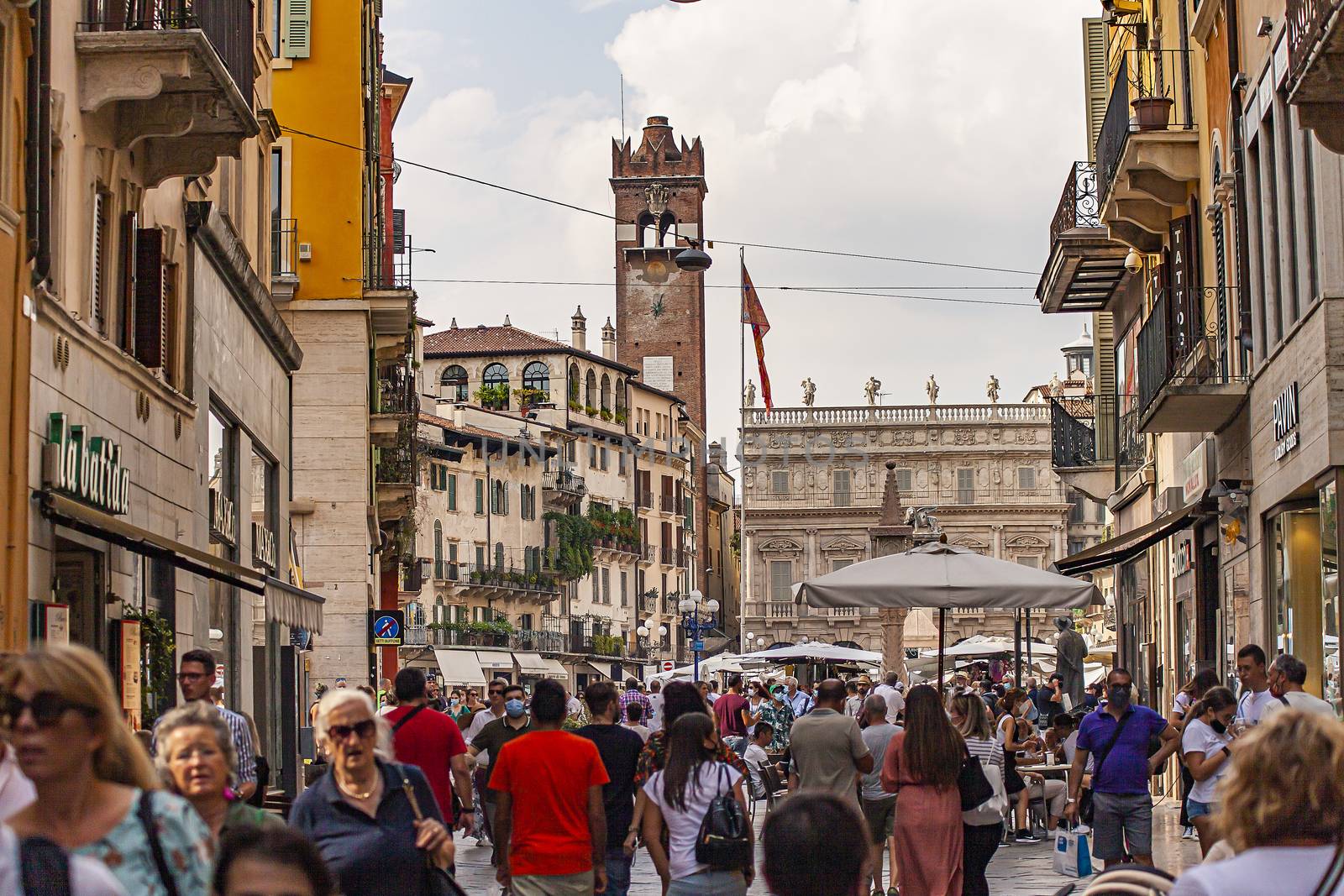 Piazza delle Erbe in Verona full of people walking 2 by pippocarlot