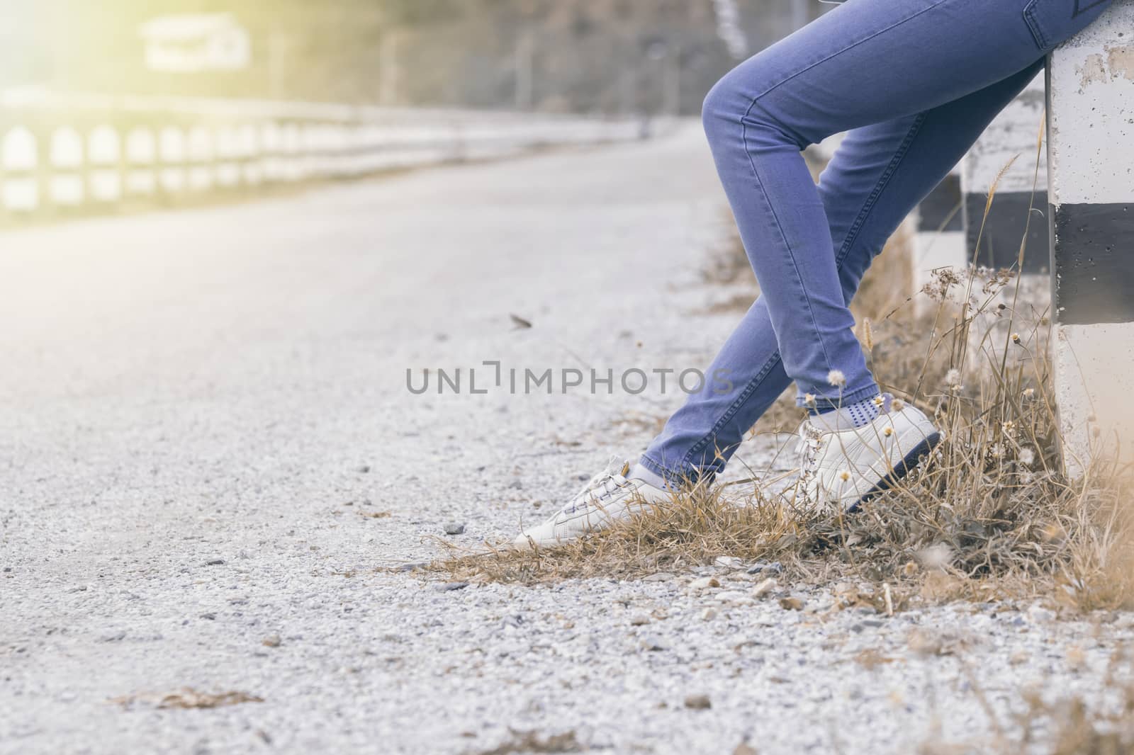 women legs and shoes on the road,concept of journey travel or sport background
