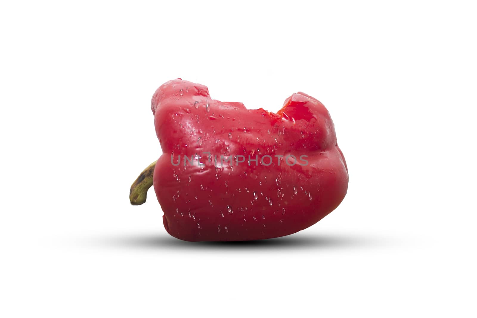Bite red bell pepper  isolated on white background by Gobba17