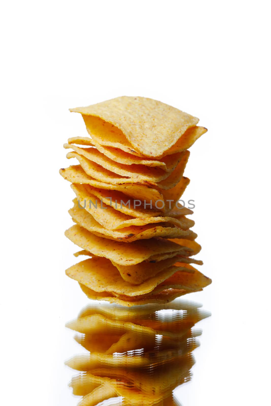 mexican nachos tortilla chips stack, isolated on white by nikkytok