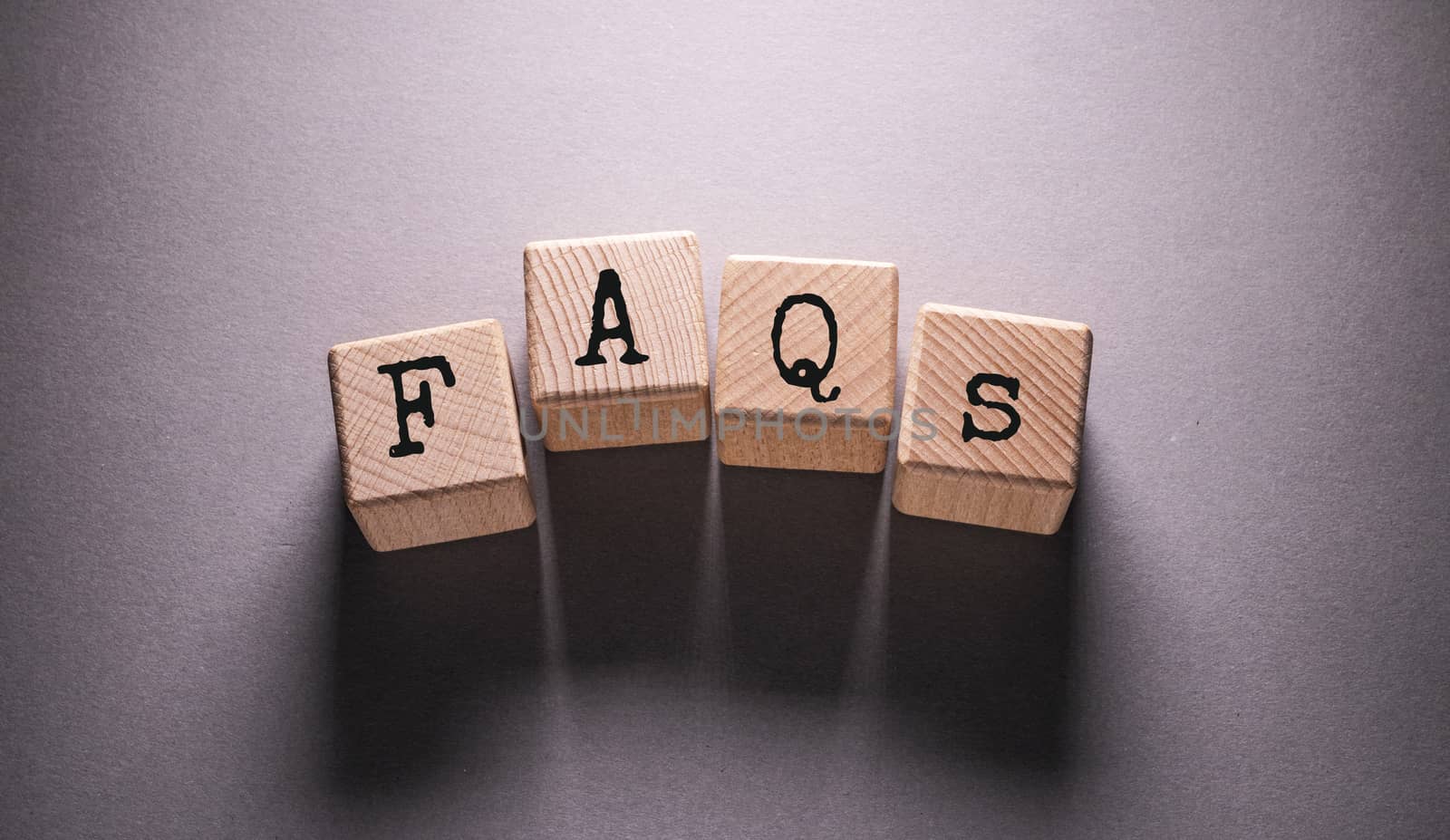 FAQ Word with Wooden Cubes by Jievani