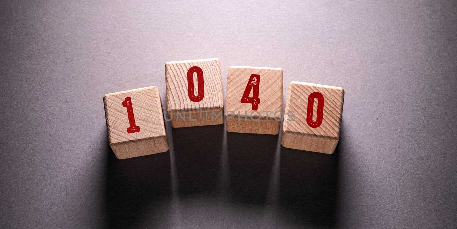 1040 Word Written on Wooden Cubes