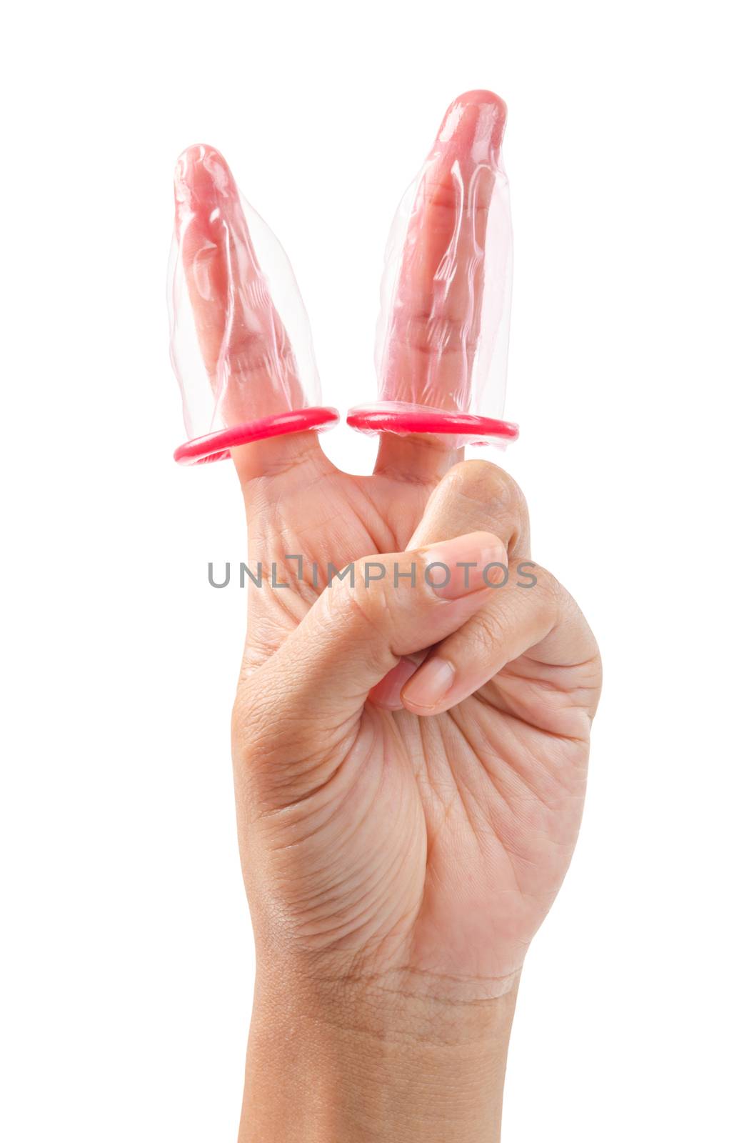 Hand shows victory sign with a pink condom isolated on white background, Save clipping path.